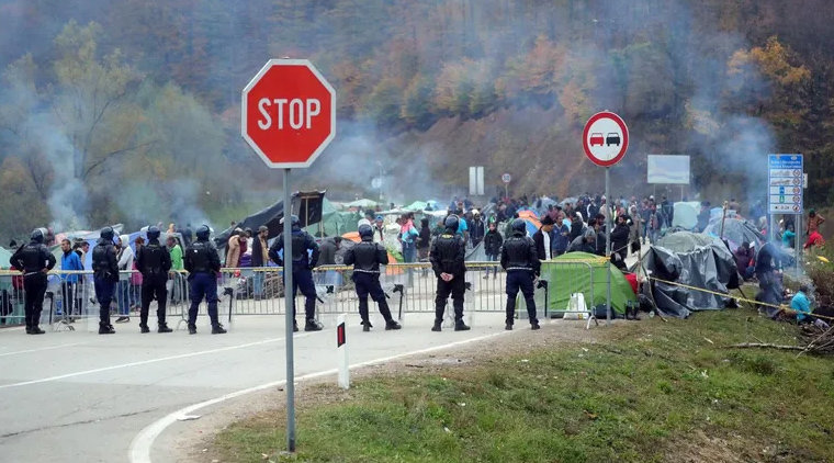 Police on the streets, migrants